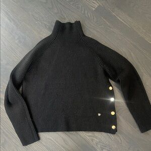 Black Turtleneck Sweater with Gold Button Accents